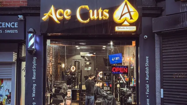 Ace Cuts lit up in the evening